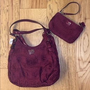 Patterned Coach purse and wristlet set